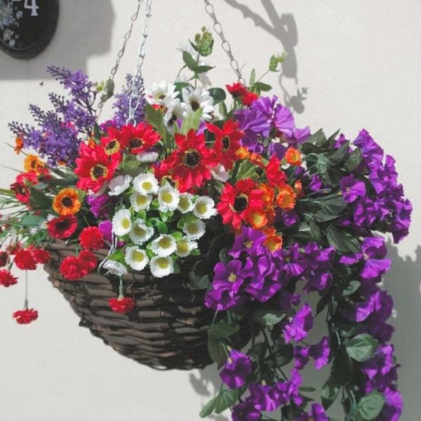 Large colourful artificial hanging basket with purple and red flowers ...